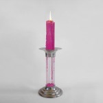 Rekindle Candle, A Candlestick Holder That Forms Melted Wax Into a New Candle