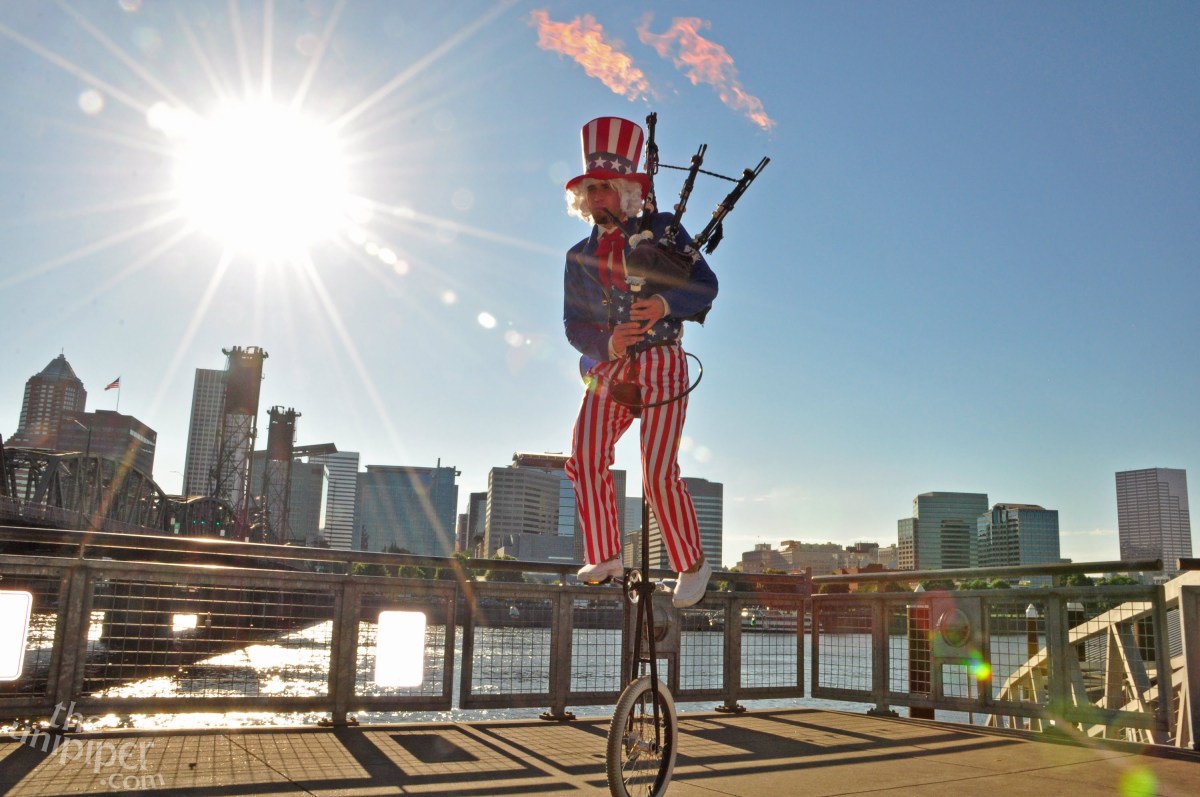 The Unipiper Playing the 1812 Overture With Flaming Bagpipes While