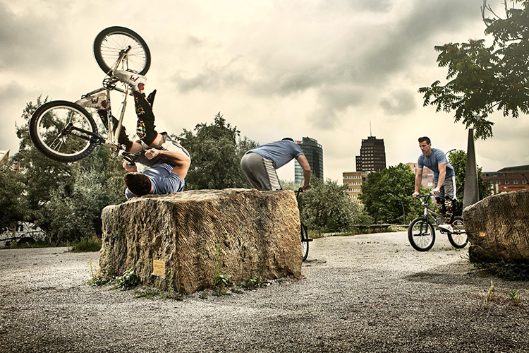 tim-knoll-performs-a-bmx-trick-over-a-st