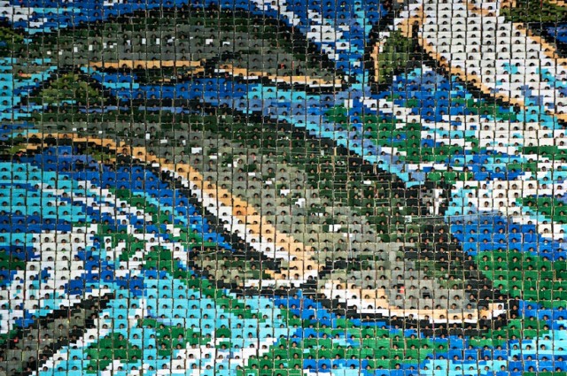 Human billboard mosaics from North Korean Mass Games by Werner Kranwetvogel