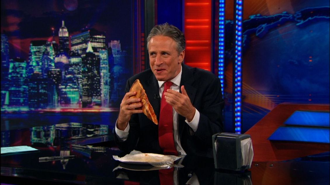 Jon Stewart Eating Pizza