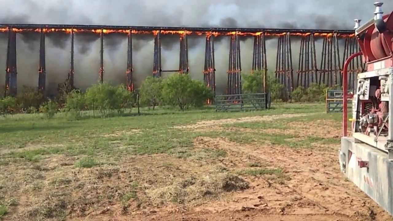 Burning Railroad Bridge Collapses Like a Line of Dominoes
