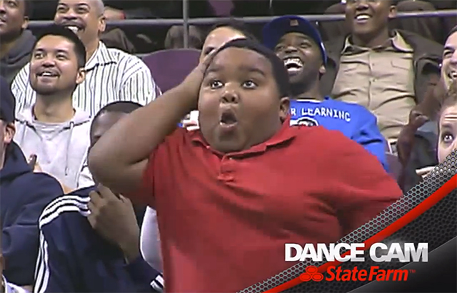 Epic Dance Battle Between a Detroit Pistons Usher and an Energetic Kid