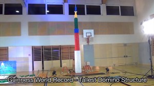 Super Tall Domino Structure Falls at the End of 100,101-Piece Domino Course For Guinness World Record