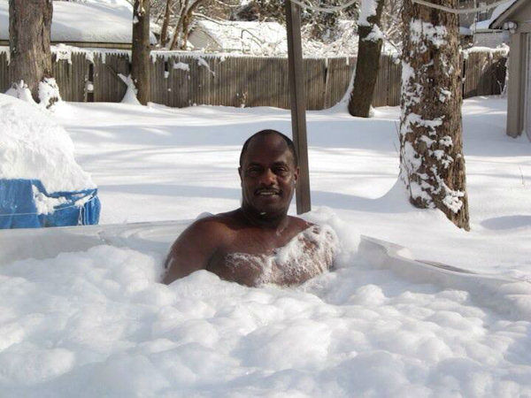 Man Celebrates Winter Storm in Hot Tub