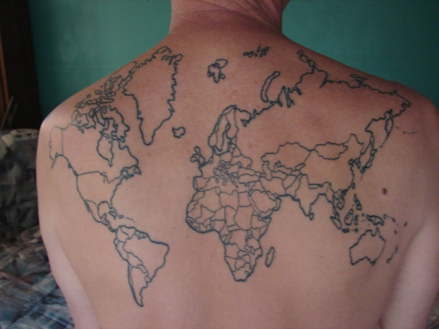 Backpacker Gets Giant World Map Tattoo on His Back, Colors In the Countries  He Visits on His Travels