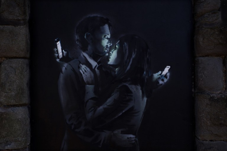 Banksy Mobile Lovers