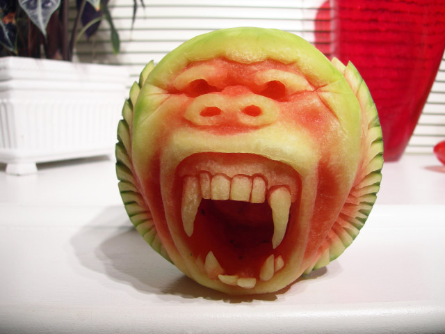 Carved Watermelon Character Sculptures by Clive Cooper