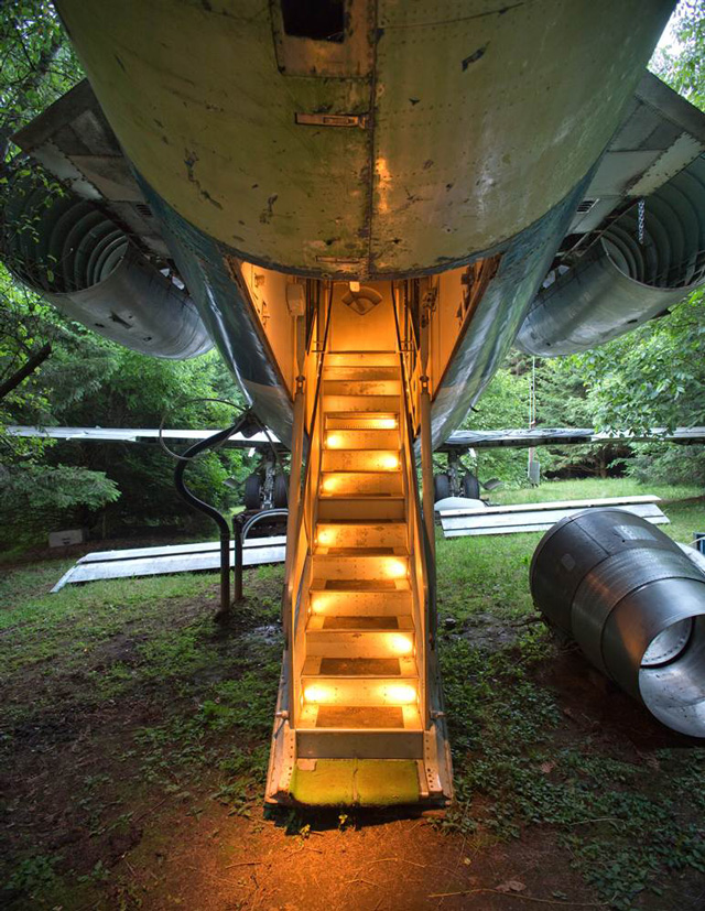 Oregon Man in a Retired Boeing 727 Airliner That is Parked in the Woods