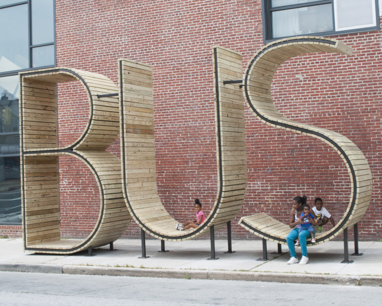 A Sculptural Bus Stop That Spells Out 'Bus' in Giant Letters