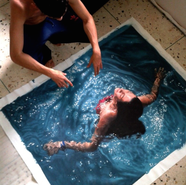 Artist Poses Creatively With His Own Hyperrealistc Paintings