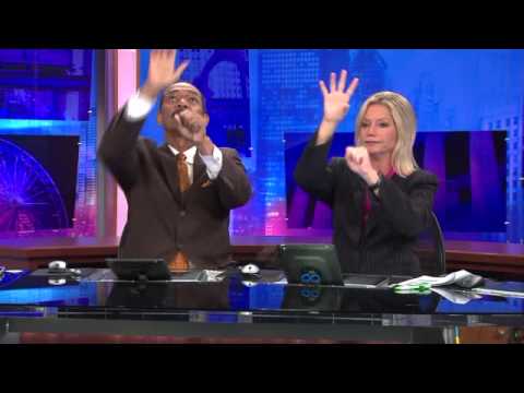 WGN-TV News Anchors Demonstrate an Elaborate Handshake 