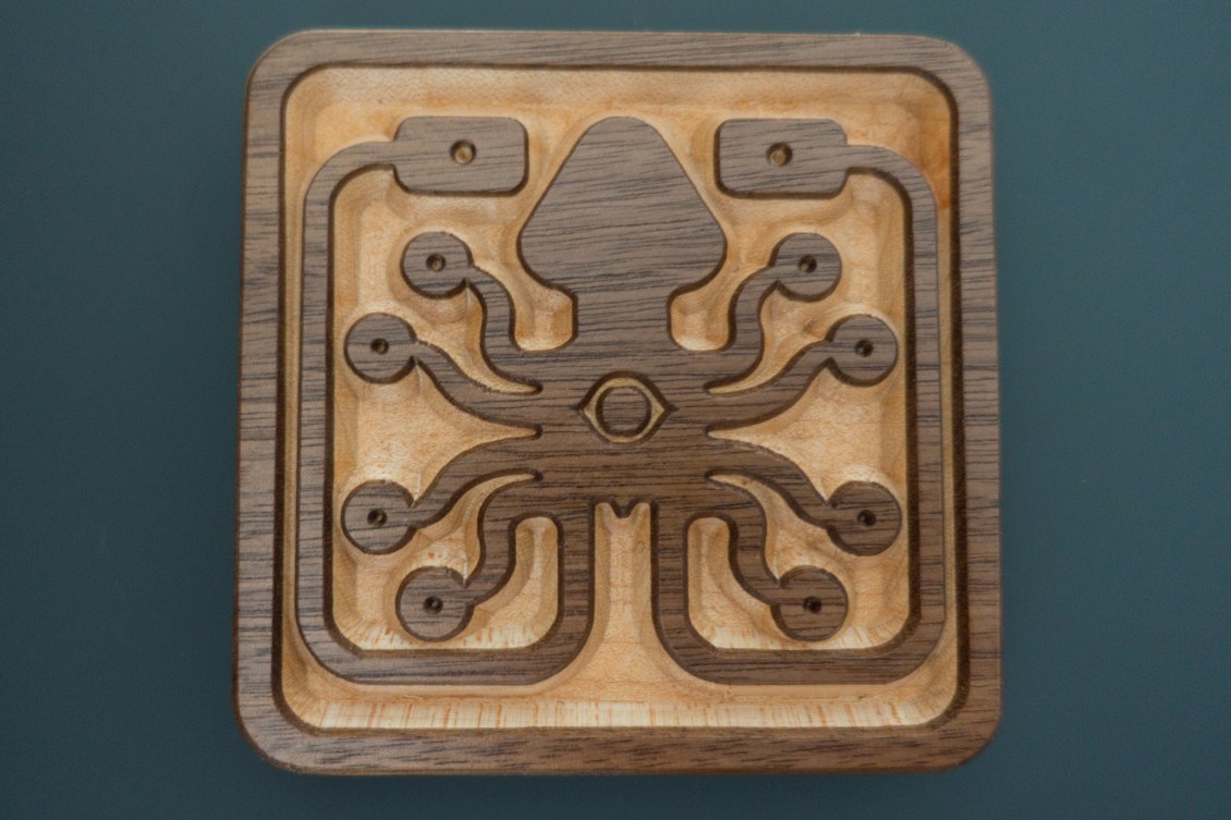 Custom Engraved Wooden Coaster with the Laughing Squid logo by WoodLab Designs