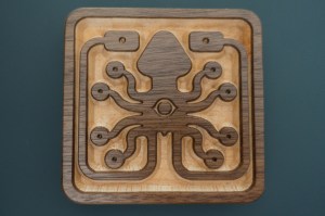 Custom Engraved Wooden Coaster with the Laughing Squid logo by WoodLab Designs