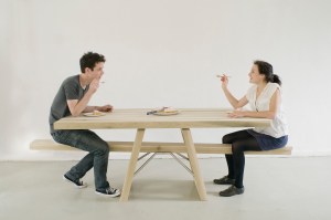 People Eating at SeeSaw Table