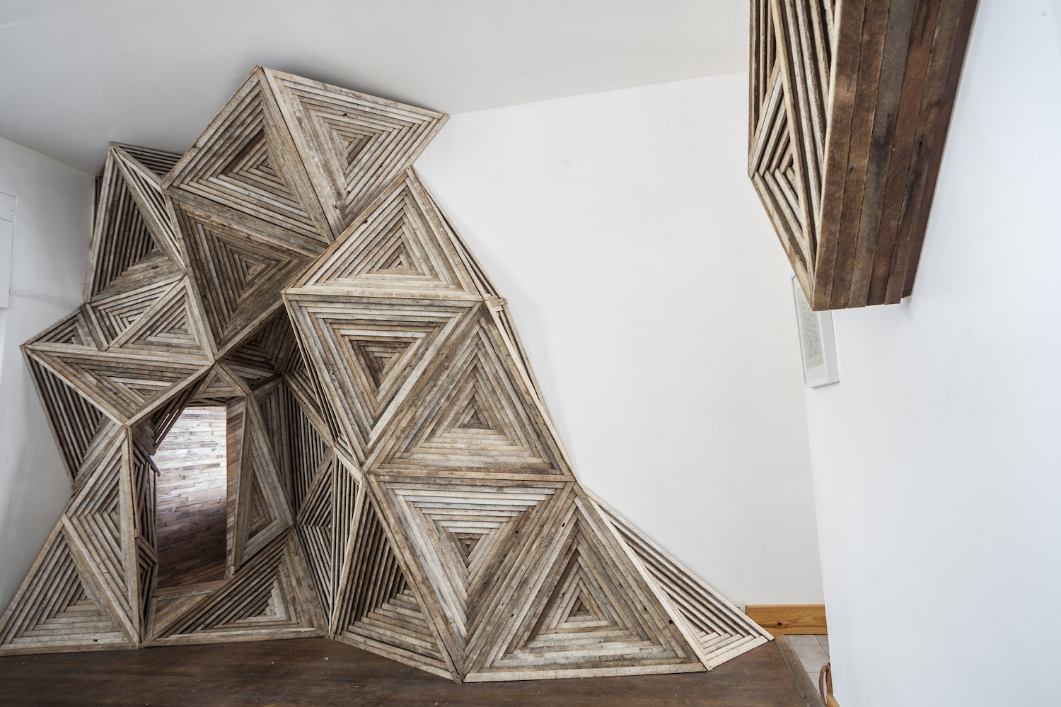 Artist Transforms Salvaged Wood Into Fascinating Geometric Installations