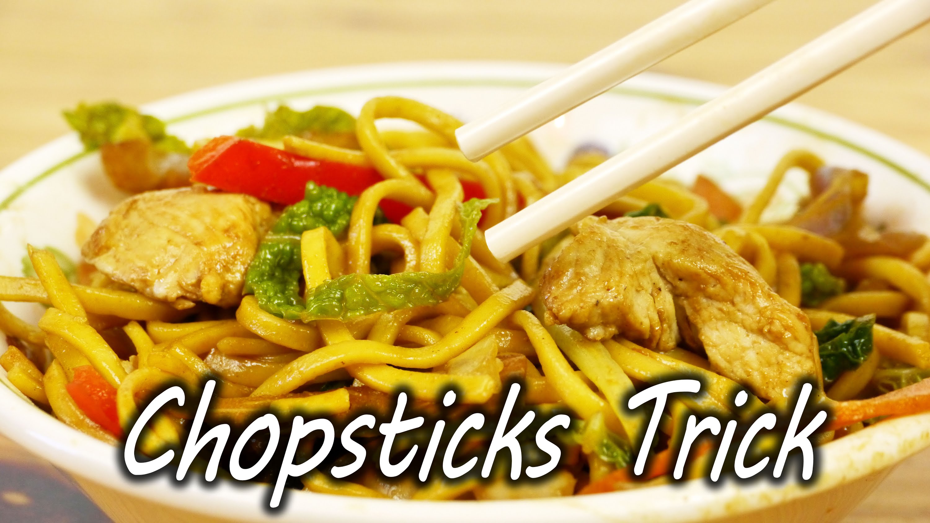 how-to-make-using-chopsticks-easier-with-a-rubber-band-and-a-strip-of-paper