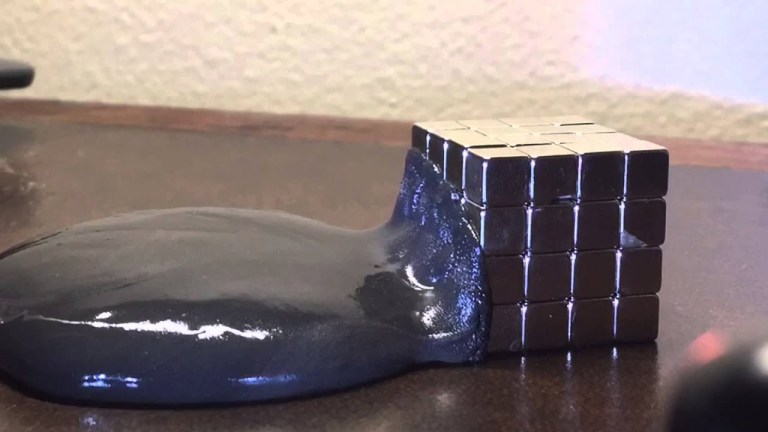 Magnetic Putty Engulfing Metal Blocks