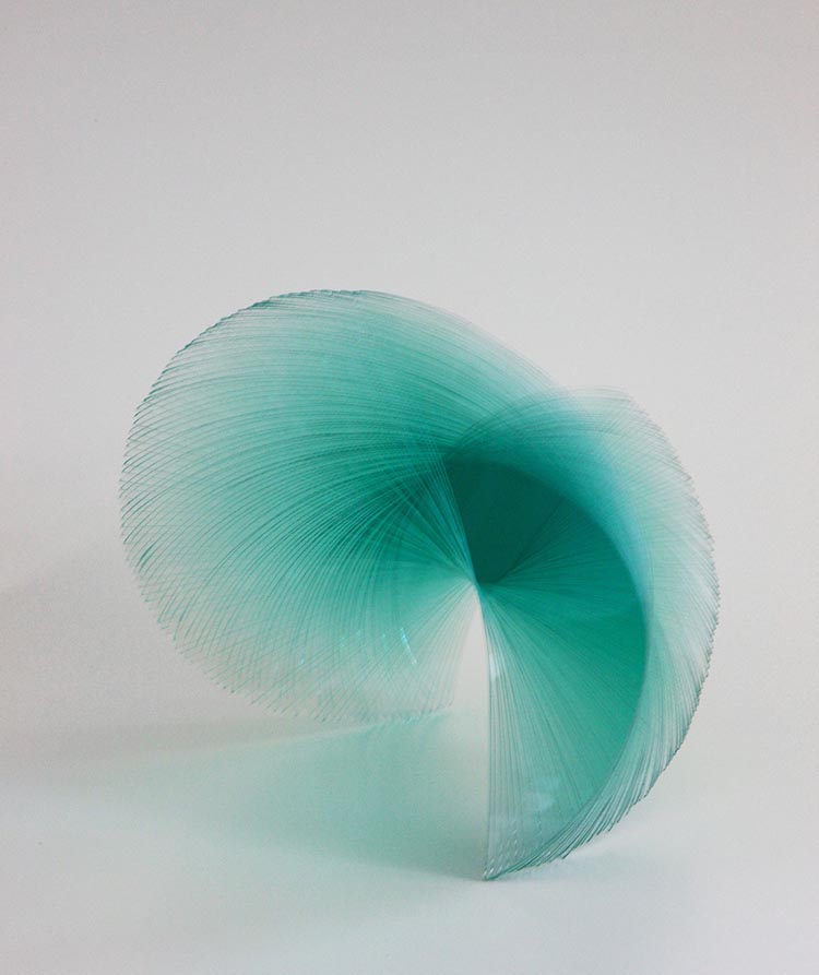 Layered Glass Sculptures Arranged in Spiraling Forms