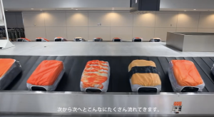 sushi suitcases on conveyor belt