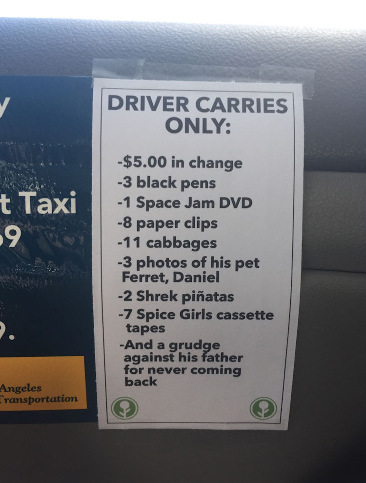 Hilarious Fake 'Driver Carries Only' Sign Left in a Los Angeles Taxi Cab