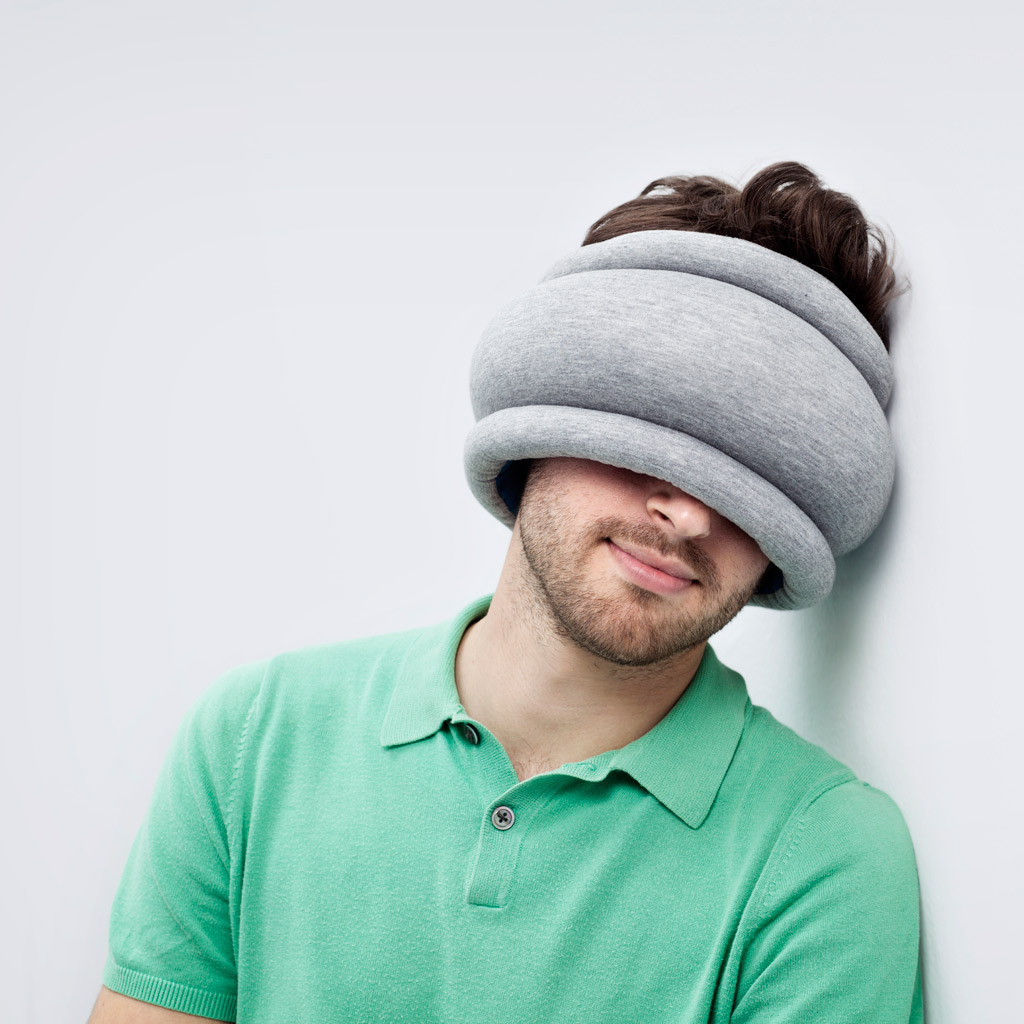 The Ostrich Pillow Light, A Unique Combination Neck Pillow and Sleep Mask for More Comfortable