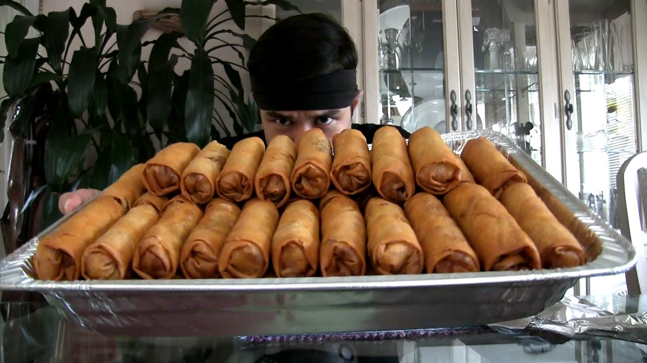 Eating 50 Egg Rolls (10,000 Calories) In 21 Minutes