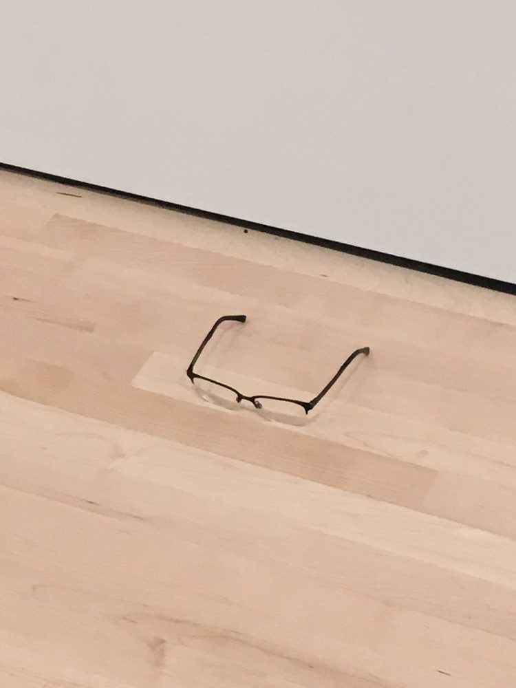 Glasses on Museum Floor