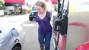 Woman Without Arms Pumps Gas