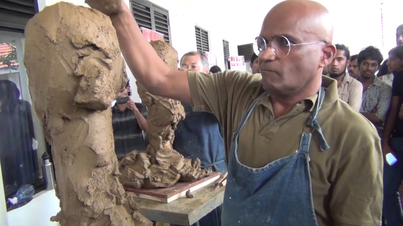 Two Talented Sculptors Simultaneously Carve Out Each Other's Likeness