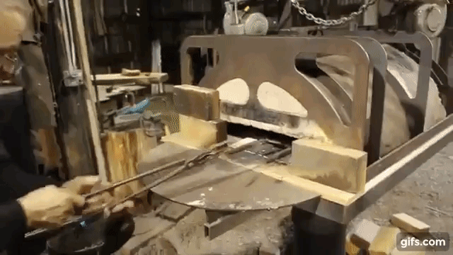 Cooking a Pizza in a metal working forge