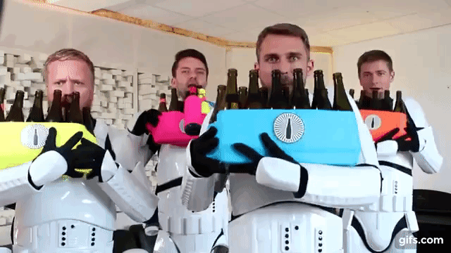 Four Storm Troopers Playing Imperial March on Bottles