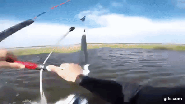 First Person Footage of Pro Kiteboarder Doing Tricks While Flying From One Body of Water to Another