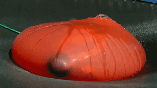 The Slow Mo Guys Submerged inside a 6ft Water Balloon. 