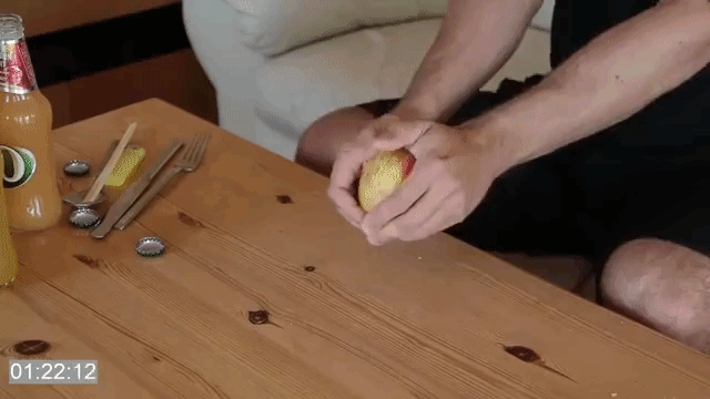 A Determined Man Quickly Learns How to Split an Apple in Half With His Hands