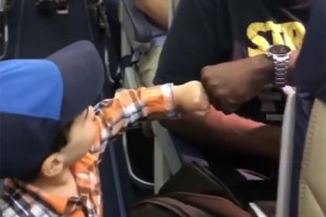 Adorable Toddler Fist Bumps Fellow Passengers on Flight, Making Everyone Smile