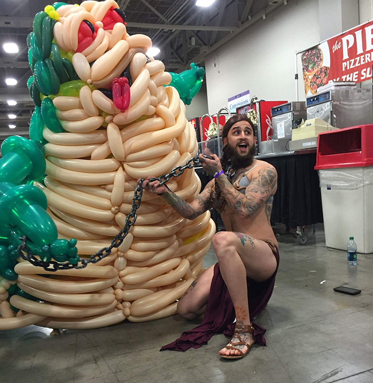 Bearded Man in Slave Leia Costume Poses With Jabba the Hutt Made Out of Balloons