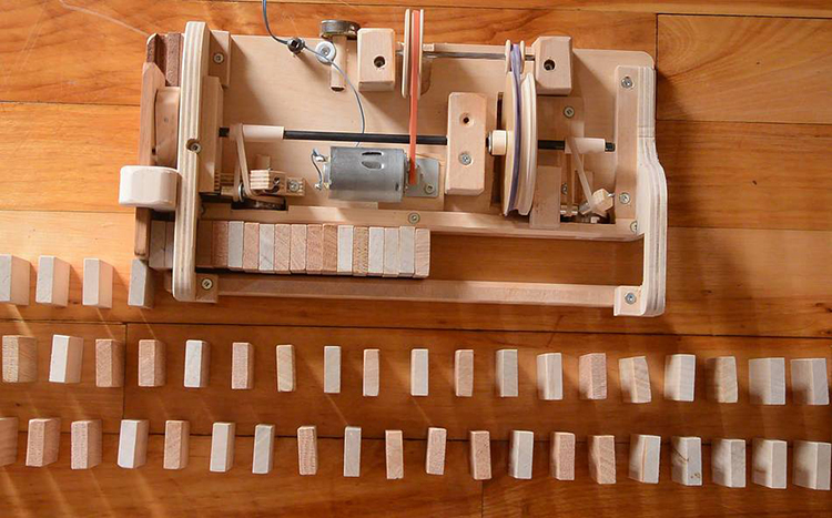 Expert Woodworker Demonstrates How he Made a Wooden Domino Row Building Machine