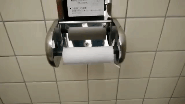 Japanese Toilet Paper Holder Allows You to Easily Change Rolls With One Hand