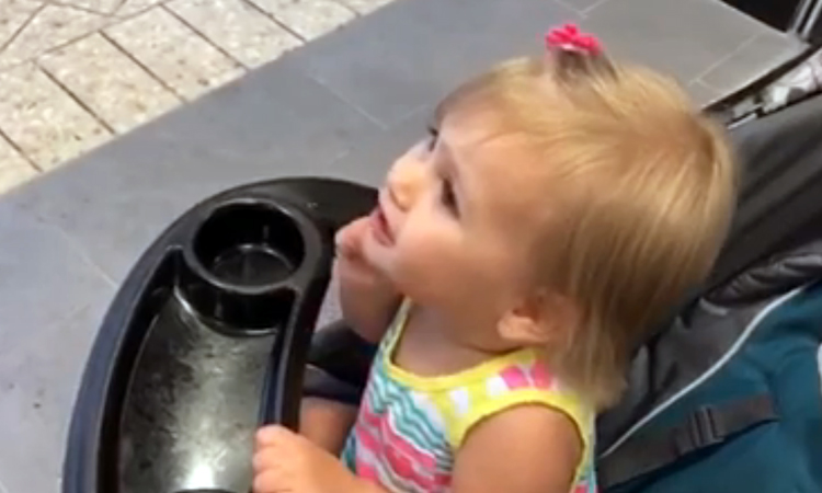 Little Girl Adorably Mistakes a Statue of Batman for Her 'Dada'
