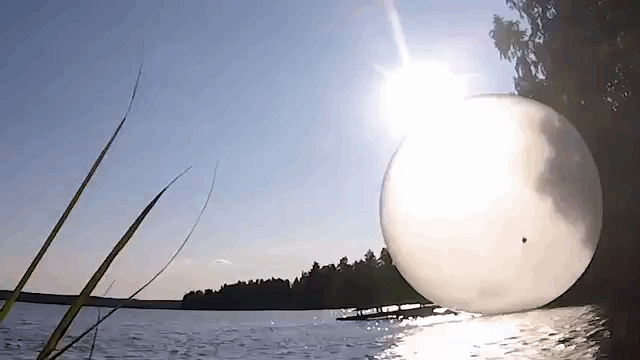A Giant Weather Balloon Inflated With a Leaf Blower Explodes in Slow Motion