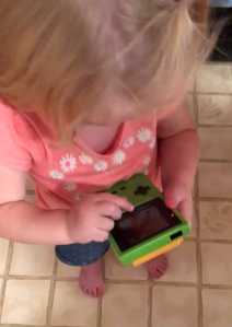 A Little Girl Tries to Play Game Boy Color and Gets Confused by the Lack of Touch Screen