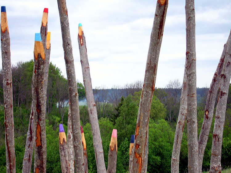 Finnish Artist Turns Fallen Aspen Trees Into Giant Colored Pencil Sculptures