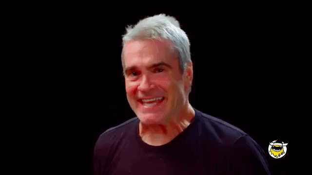 Henry Rollins Tells High-Octane Stories About His Life While Eating Progressively Spicy Wings