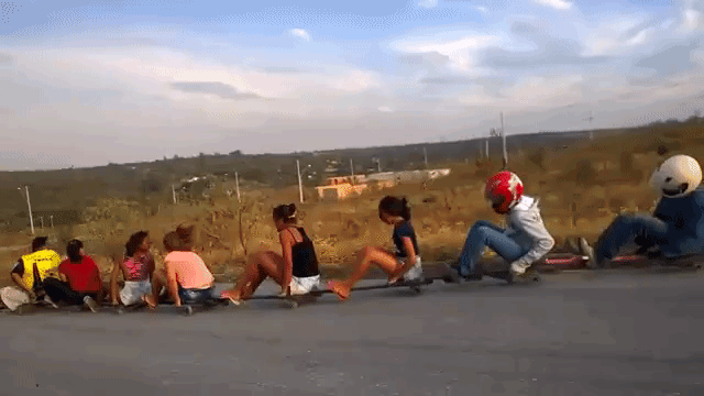 Thrill Seekers in Brazil Engage in an Exciting Downhill Roller-Cart Ride