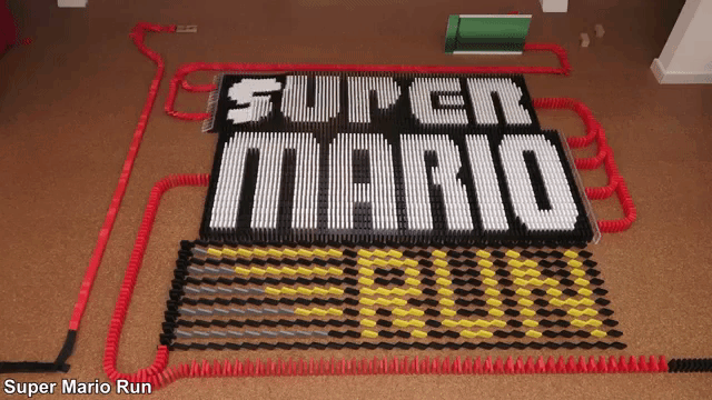 20,000 Dominoes Topple Over in a Display Designed to Look Like Popular Gaming Apps