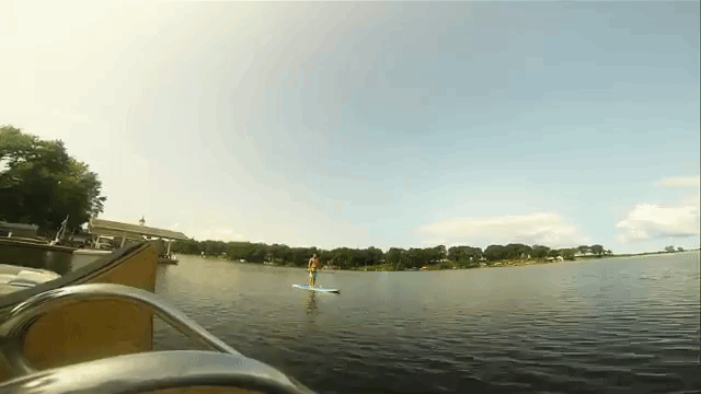 A Man Does a Bicycle Backflip Over Open Water and Smashes Into a Flying Drone