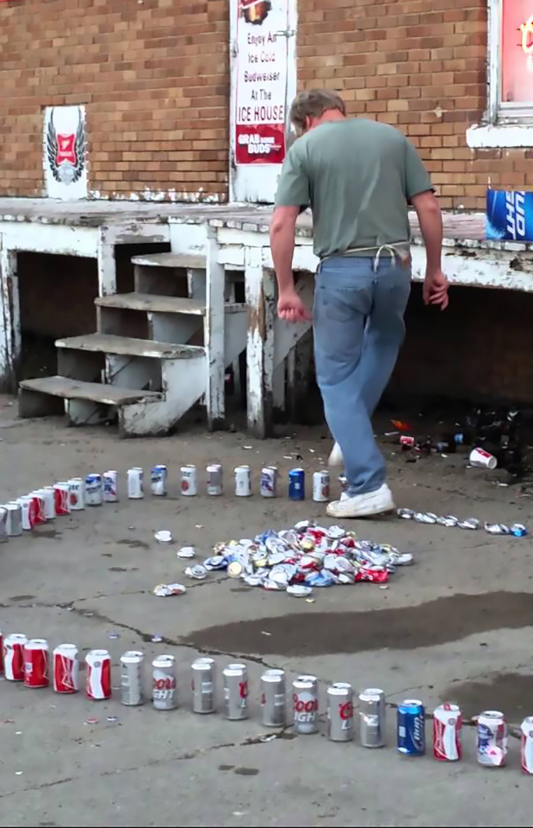 Amazing Man Quickly Crushes a Long Line of Aluminum Cans