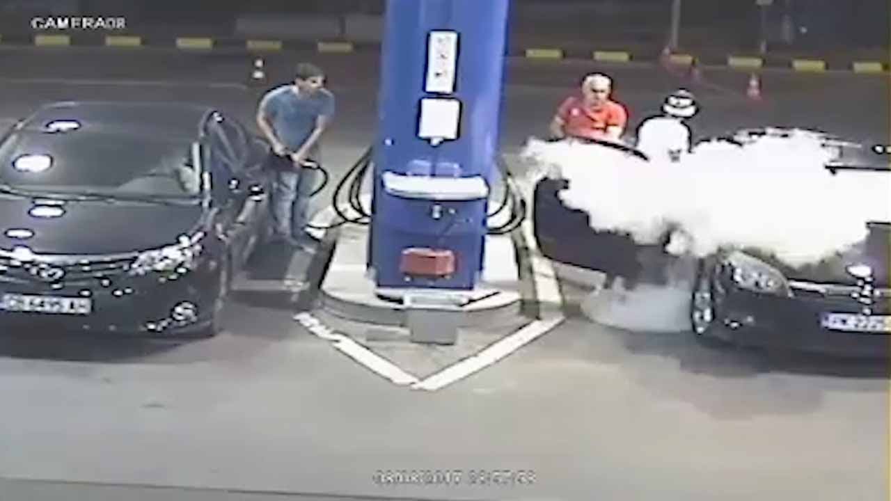 Fed Up Gas Station Employee Sprays Cigarette Smoker at the Pump With a