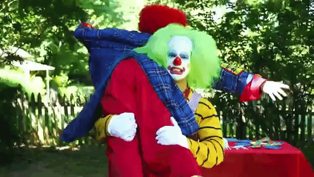 Two Clowns Face Off in an Over the Top Battle at a Kids' Birthday Party